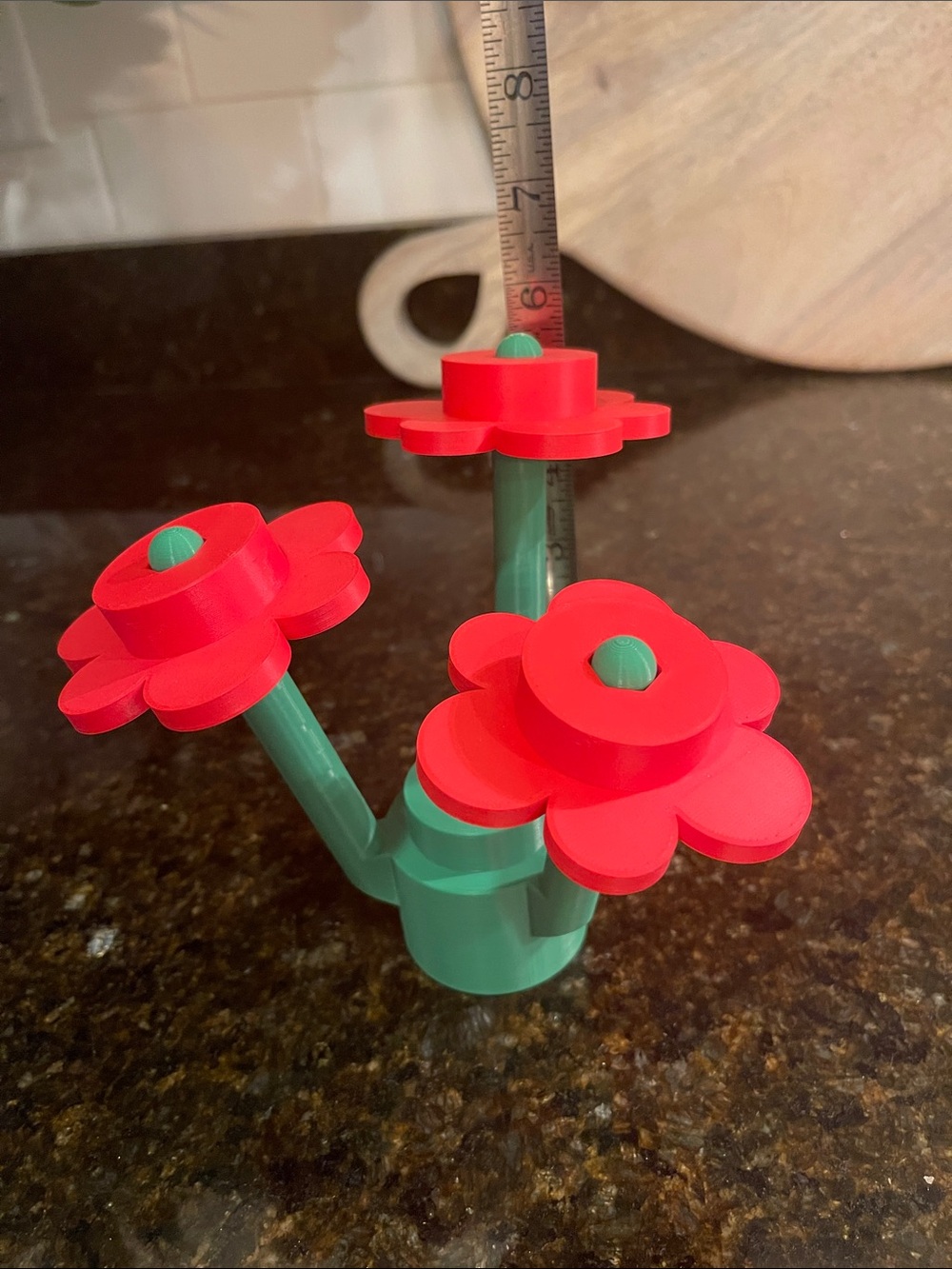 Giant Lego-inspired Red Flower Toy Set with Green Stems